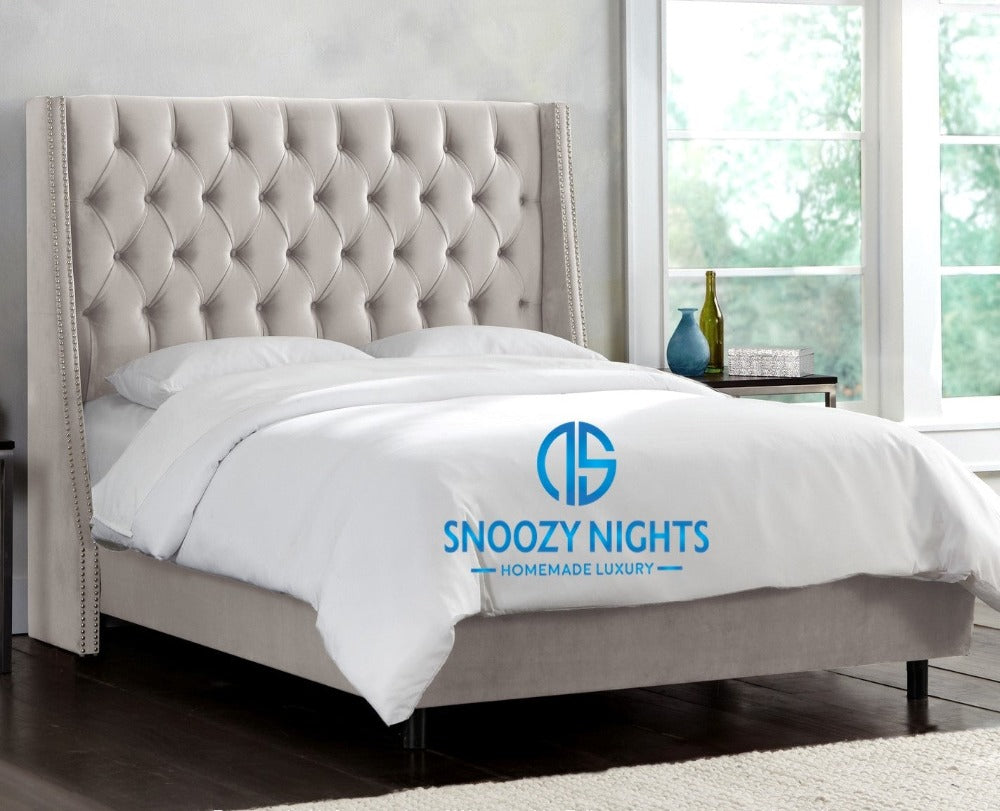 Vanessa Cushioned Nail Studded Wingback Bed Frame
